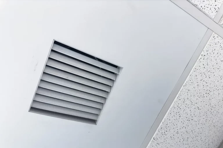 Closeup of clean metal ductwork in a modern air ventilation system related to mold growth and humidity