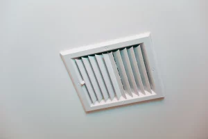 Closeup of a clean metal air duct in a modern ventilation system related to mold myths