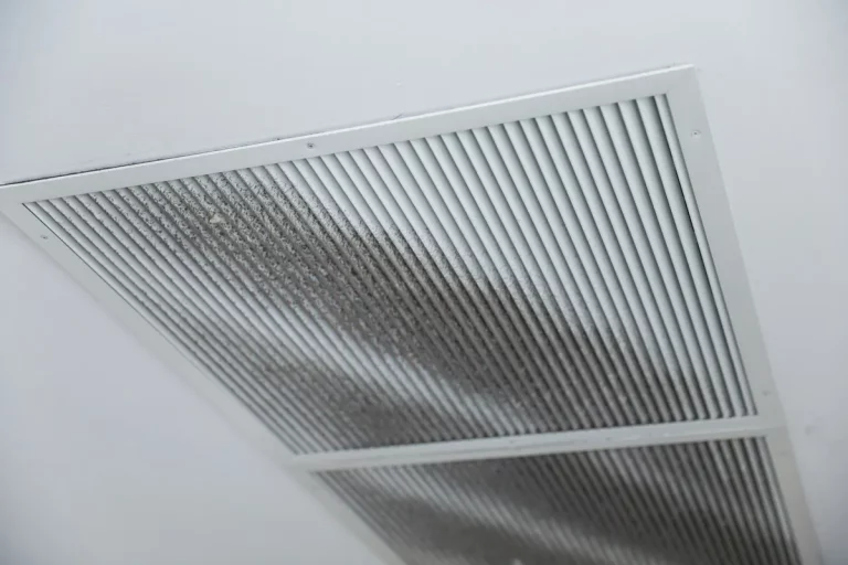 Closeup of clean metal ductwork in a modern air ventilation system related to mold development