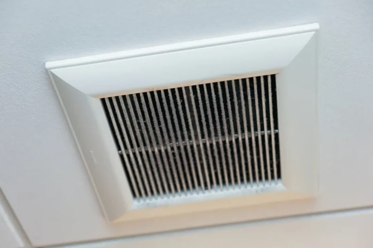 Closeup of clean metal ductwork in a modern air ventilation system related to mold concerns